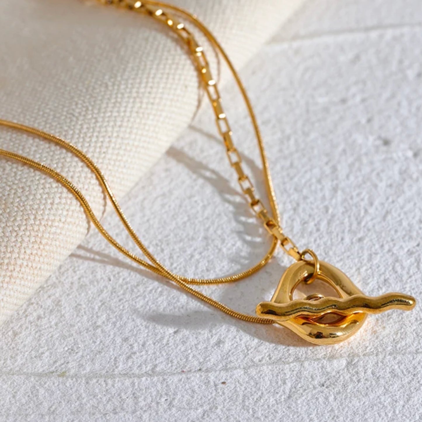 RIPPLE - 18K GOLD PLATED NECKLACE / THE. WAVE COLLECTION